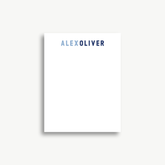 A white piece of paper with the word "ALEXOLIVER" printed on it.