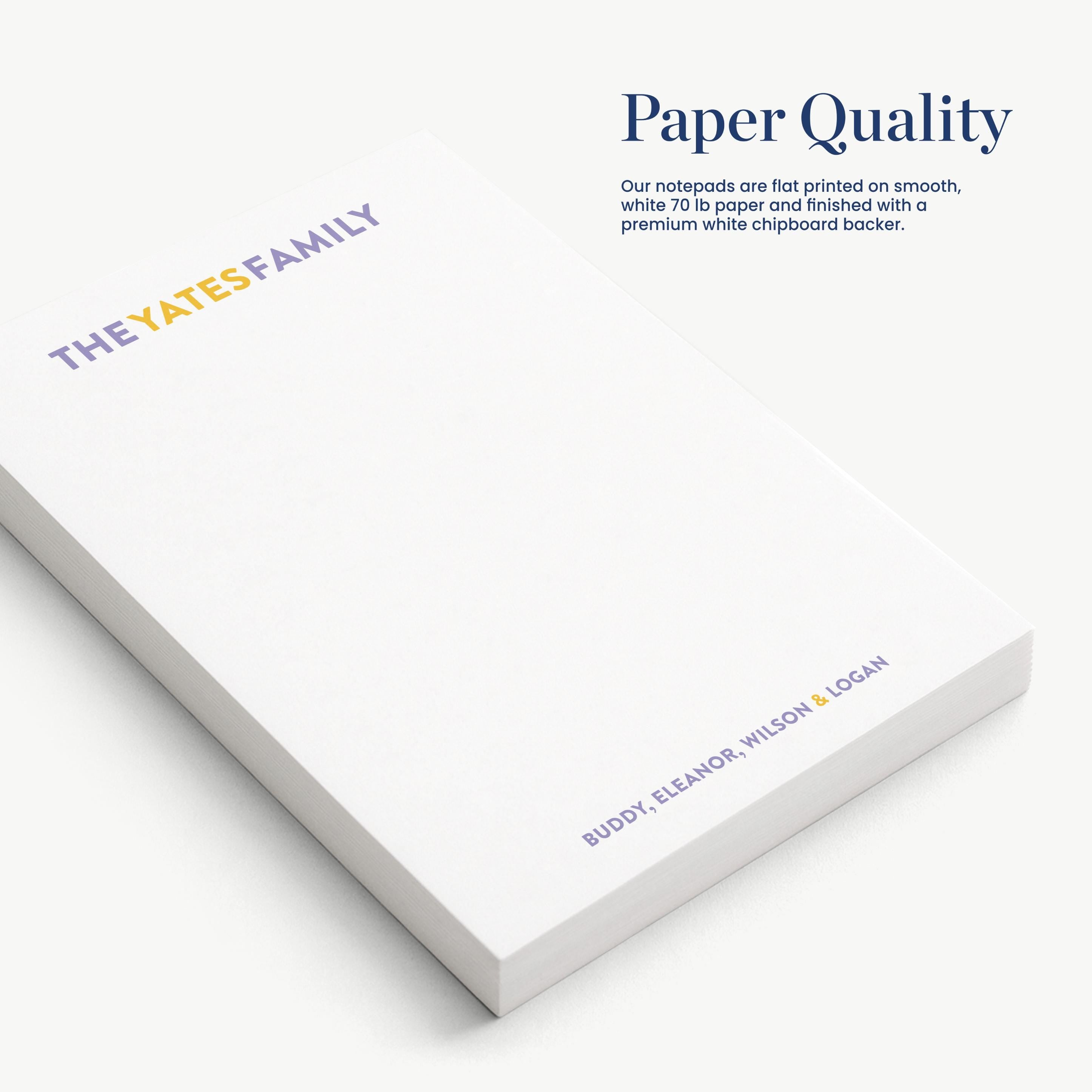 a white notepad with the text "Paper Quality" and "The Yates' Family" printed on it.